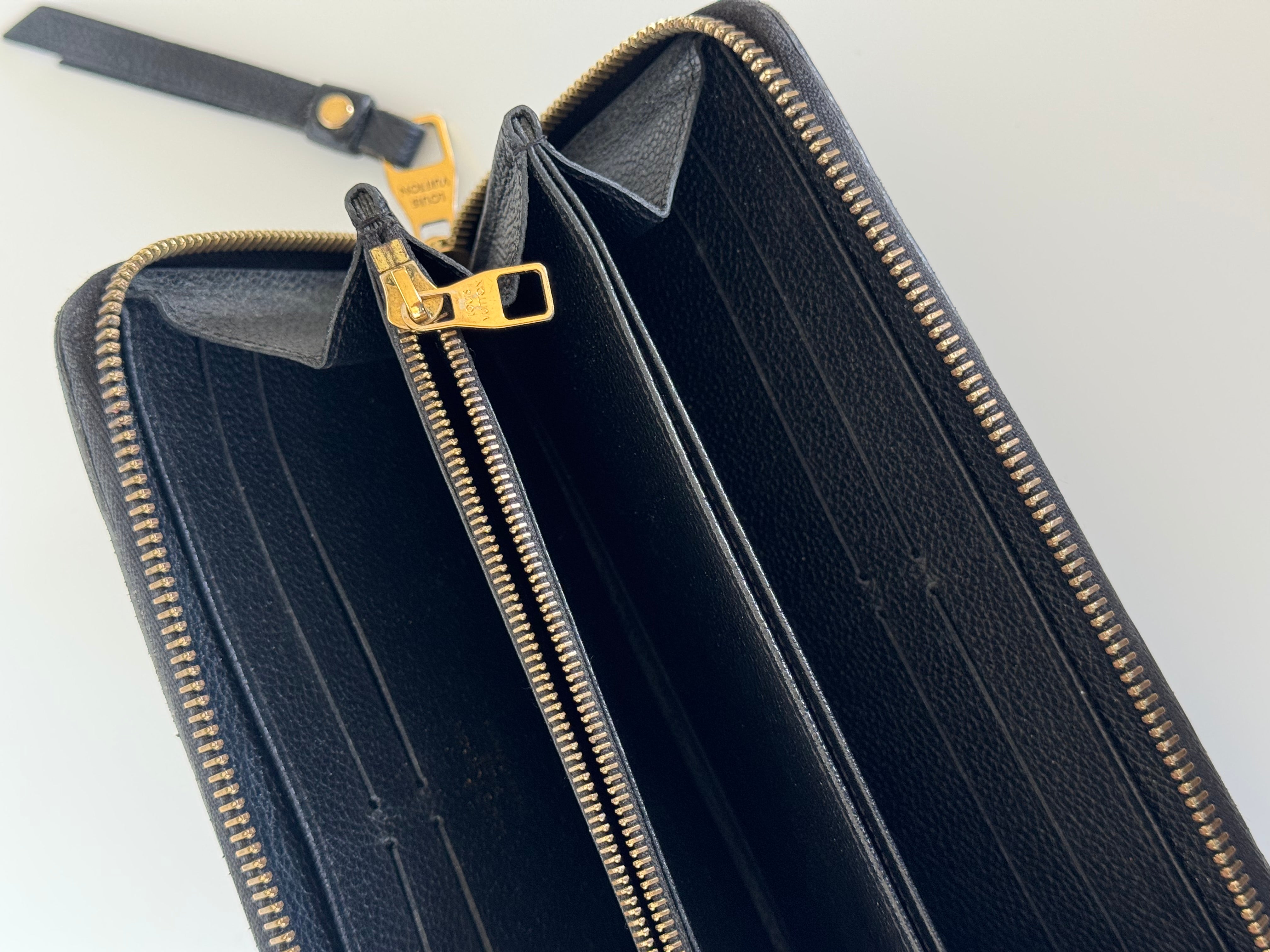 Louis Vuitton Monogram Empreinte Leather Zippy Wallet